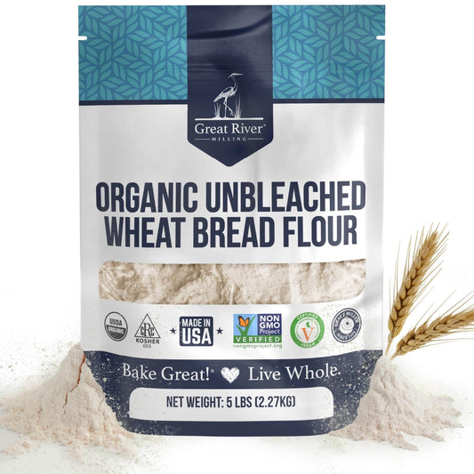 Organic Bread Flour bag by Great River Milling with wheat stalks and flour around it