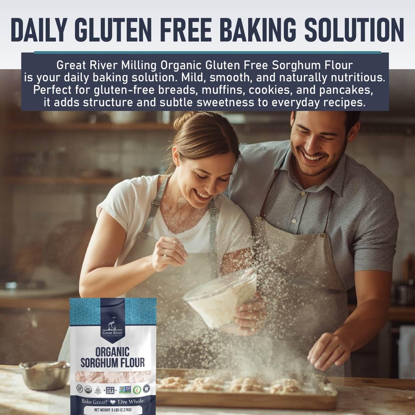A smiling couple bakes in a kitchen, dusted with flour. In the foreground, a 25 lb bag of Great River Milling Organic Sorghum Flour is displayed, showcasing its packaging and label