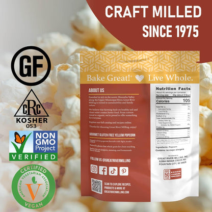 Great River Milling Gourmet Yellow Popcorn Kernels in a resealable bag with vivid branding. The packaging highlights certifications and nutritional information against a backdrop of popped popcorn