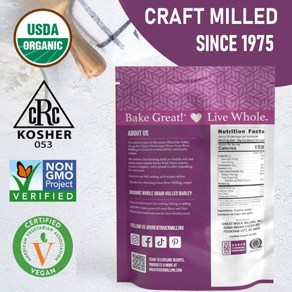 The Great River Milling Organic Hulled Barley is packaged in a 25 lb bag featuring a purple design with nutritional facts. It is certified organic, non-GMO, and vegan