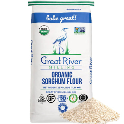 A 25 lb bag of Great River Milling Organic Sorghum Flour with a white and blue design, featuring a crane illustration and organic certification logos