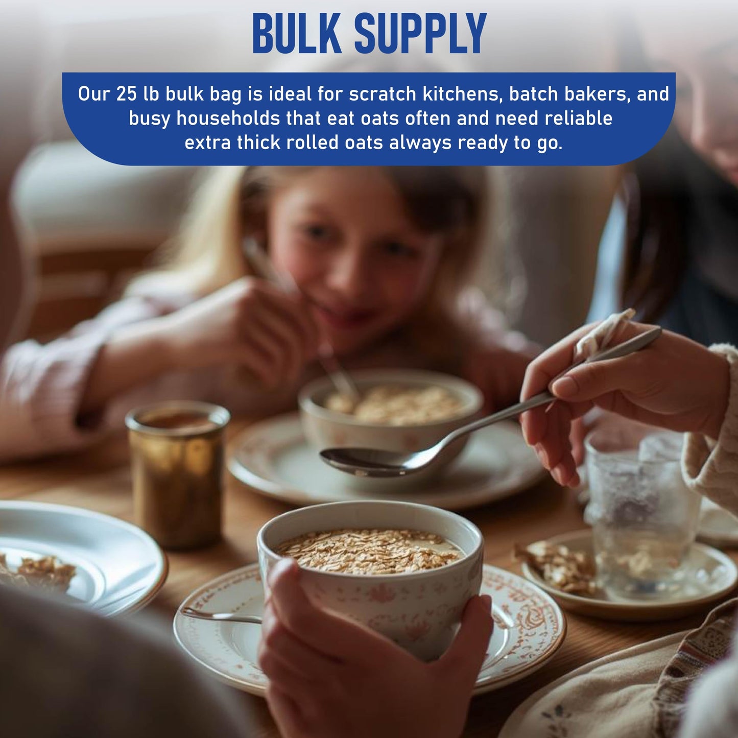 A bowl filled with Great River Milling Organic Extra Thick Rolled Oats is being served at a table with children. The oats have a substantial, chewy texture