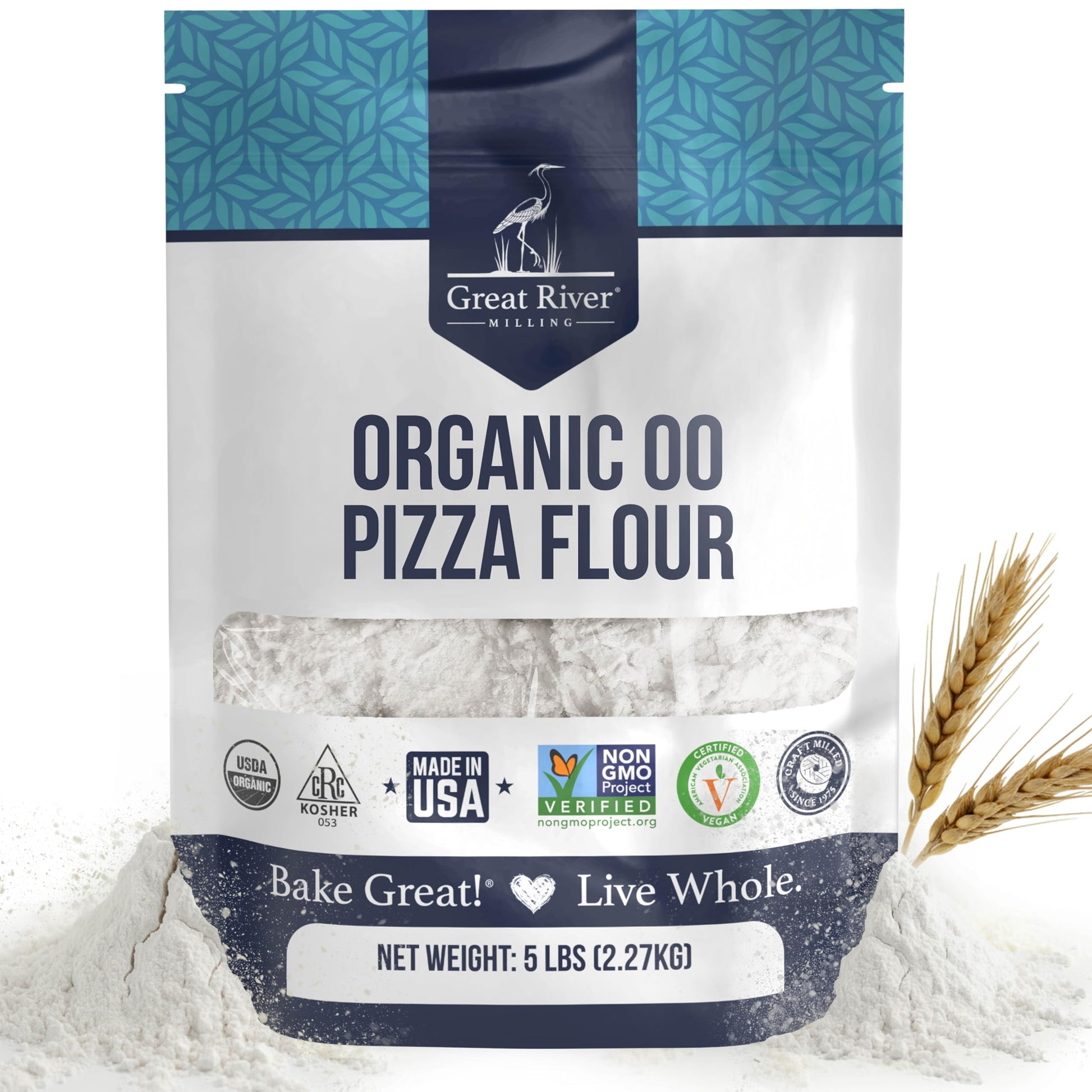 A 5-pound bag of Organic 00 Pizza Flour stands upright with flour and wheat stalks beside it. The packaging displays certifications and baking slogans, highlighting its use of organic wheat flour—perfect for crafting an authentic Neapolitan pizza crust at home.