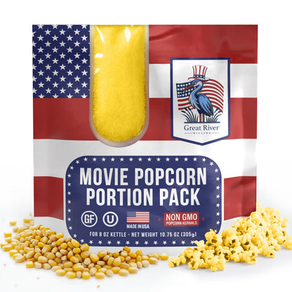 A bag labeled Popcorn Portion Pack — 8 oz Bags (24-Count), featuring pre-measured bags of popcorn kernels and yellow seasoning, is displayed with a design that includes the U.S. flag and a blue heron logo. The text emphasizes that the product is gluten-free and non-GMO.
