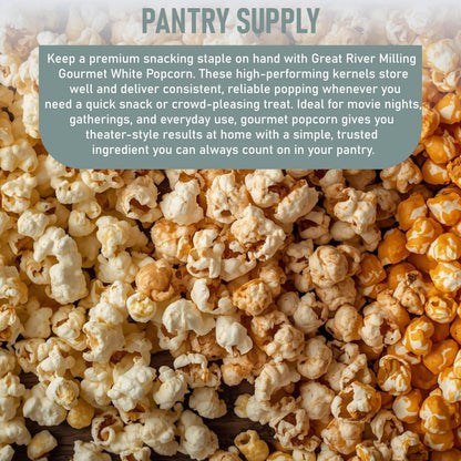 Great River Milling Gourmet White Popcorn Kernels scattered on a wooden surface, showcasing their small, tender, and crisp appearance with a mix of popped and unpopped kernels